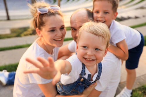 family-leisure-happy-family-walk-city-park